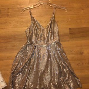 Keeps Getting Better Gold Skater Dress